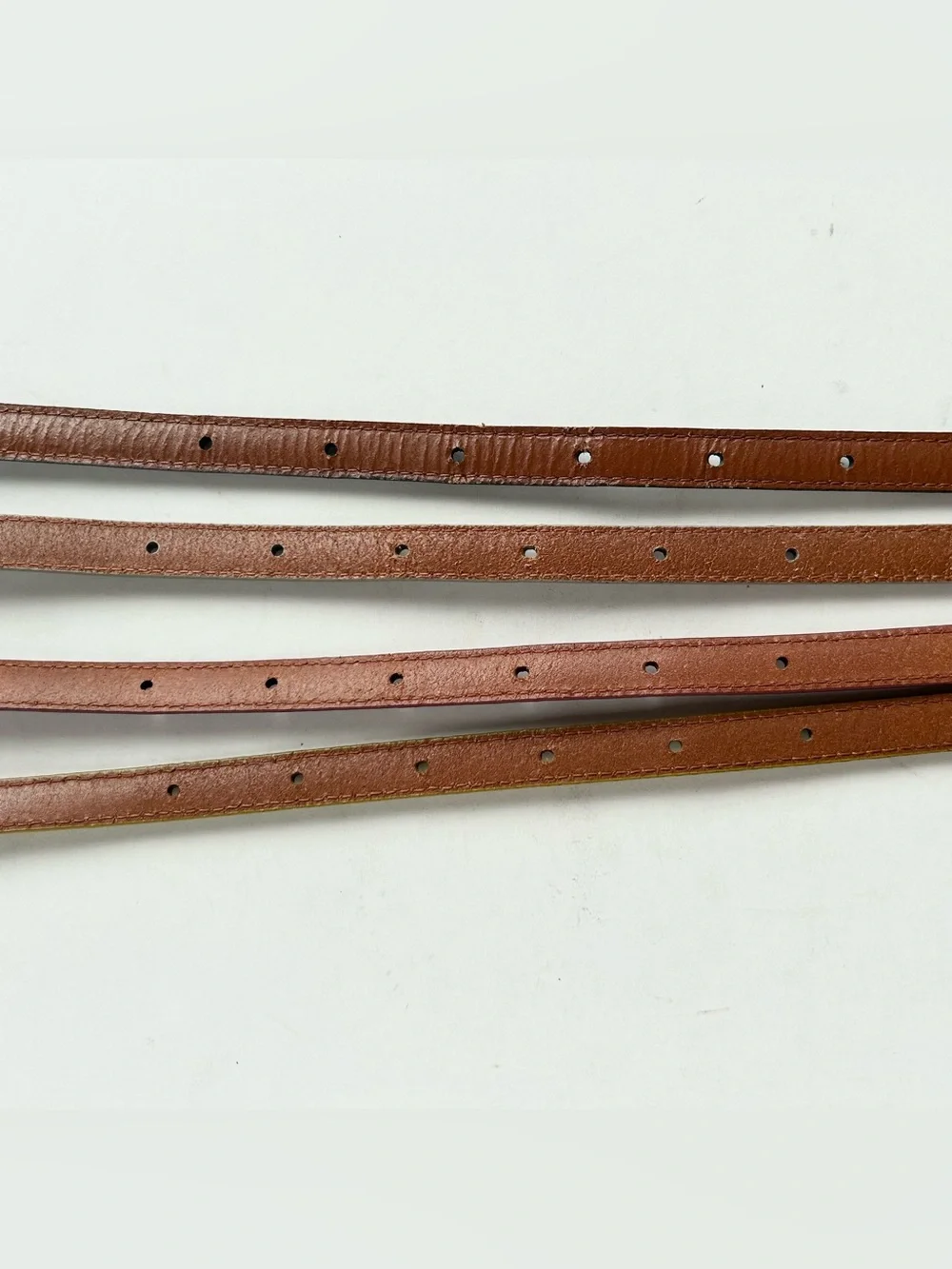 4 X Uniqlo lacquered leather skinny belt